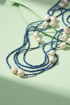 The blue lapis beaded long necklace, 180cm in length, features freshwater baroque pearls of AAA class quality. This stunning piece combines deep blue lapis beads with lustrous pearls, creating a unique and elegant design perfect for layering or wearing solo. Product Details: Material: freshwater baroque pearls, blue lapis. Necklace Length: 180cm/70 inches Design: blue lapis with baroque pearls Style: Elegant, Refined Occasion: Ideal for elegant daily wear or enhancing special occasion attire Pro Baroque Pearls Necklace, Lapis Necklace, Golden South Sea Pearls, Mabe Pearl, Pearl Jewelry Necklace, Purple Pearl, Pearl Necklaces, Blue Lapis, Necklaces Jewelry