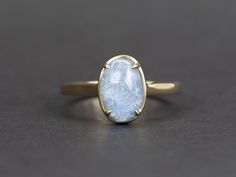 ♥ 1.96ct Oval Blue Dumortierite Quartz 9K Gold Ring♥ Solid 9k yellow gold ring set with a beautiful oval-shaped quartz♥ Gorgeous blue color!♥ The item measures 10.9 mm in length, 6.5 mm in width, and stands 6.8 mm from the finger
♥ US Size 7 (Free resizing up or down 1 size)♥ Band width: 1.9mm♥ Gemstone: Quartz, 1.96ct; , ct♥ All stone(s) used are genuine, earth-mined, and guaranteed conflict free! As is with anything that is naturally occurring, our gemstones or pearls will have imperfections, Oval Moonstone Ring In Yellow Gold, Oval Yellow Gold Moonstone Ring, Classic Blue Oval Opal Ring, Oval Solitaire Moonstone Ring In 14k Gold, Oval Moonstone Ring For Formal Occasions, Formal Oval Moonstone Ring Birthstone, Gold Oval Solitaire Moonstone Ring, Elegant Oval Untreated Opal Ring, Elegant Untreated Oval Opal Ring