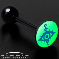 an image of a green glow in the dark belly button with evil eye on it