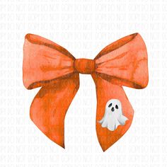 an orange bow with a ghost on it