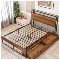 the bed frame is made from metal and wood