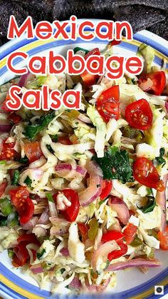 mexican cabbage salad with tomatoes and onions on a plate