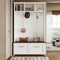 a living room with white cabinets and shelves filled with items on top of each shelf