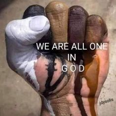 a person's hand with the words we are all one in god