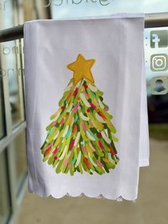 a handmade christmas tree on a white towel