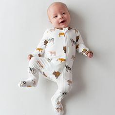 Cut from our silky smooth bamboo rayon, these soft and snuggly footies come in a rainbow of modern, earthy colors. The stretchy material gives you the option of a snug or looser fit, while keeping baby comfortable and stylish. 97% Bamboo Rayon, 3% Spandex Dual zipper Breathable material Sole grips for 6-12 months and up Fold over cuffs to prevent scratching on sizes preemie, newborn, and 0-3 months Please note: Due to how the fabric for prints is cut and sewn each garment will have a unique placement of print. Cow Colour, Book Dress, Jersey Cow, Nap Mat, Long Hair Color, Bamboo Clothing, Baby Pajamas, Earthy Colors, Kids Pajamas