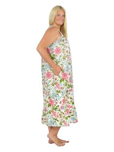 This 100% cotton sleeveless gown has a sweetheart neckline trimmed with beautiful cotton crochet lace beaded with ribbon trim. The soft cotton fabric is printed with a rich English Garden print teeming with delicate blooms. The 5 button placket opening makes it easy to put on and take off. A full flounce is added to the mid-calf hemline for added ease in walking. Side seam pockets have been added for convenience and can accommodate small items. Style: GownMaterial: 100% CottonPattern: Floral Nec Sleeveless Lace Trim Nightgown For Vacation, Sleeveless Cotton Nightgown For Vacation, Cotton Sleeveless Nightgown For Vacation, Spring Cotton Nightgown With Floral Print, Spring Floral Print Cotton Nightgown, Sleeveless Cotton Nightgown With Lace Trim, Spring Cotton Nightgown With Lace Trim, Sleeveless Cotton Floral Print Nightgown, Sleeveless Floral Print Nightgown For Vacation