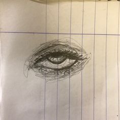 a pencil drawing of an eye on top of a piece of paper