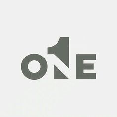 the word one is written in black and white on a light gray background with an arrow