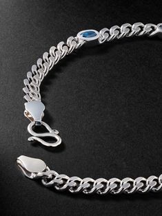 "We create jewellery that feels personal and meaningful, emotively weaving references of Thai culture into our pieces"; says Bangkok-based PATTARAPHAN. This 'Benja Baby Ying' bracelet is handcrafted from rhodium-plated sterling silver and set with five London blue topaz stones. Fusion Style Silver Jewelry With Blue Topaz, Luxury Silver Bracelet With Blue Topaz, Luxury Silver Bracelets With Blue Topaz, Blue Stone Bracelet, Topaz Bracelet, Thai Culture, Lapis Lazuli Bracelet, Gold Topaz, Mens Gold Jewelry