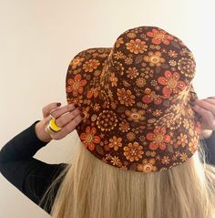 This is the Groovy Retro Floral wide brim sun hat. Handmade from an exclusive Stan&Gwyn print. These hats are reversible with a choice of yellow or brown for the reverse side. The hat features self colour top stitching and a Stan&Gwyn label on the brim. It's always best if you provide me with your exact head measurement for an accurate fit.  Otherwise please choose from the following sizes - Small - 22" Med - 23" Large - 24" XL - 25" These hats are very lightweight so easy to pack for your summe Vintage Brown Sun Hat With Flat Brim, Vintage Brown Flat Brim Sun Hat, Vintage Brown Hats For Beach, Vintage Brown Fedora Sun Hat, Retro Wide Brim Sun Hat For Summer, Vintage Brown Wide Brim Sun Hat, Retro Wide Brim Summer Hat, Retro Brimmed Sun Hat For Summer, Retro Summer Hat With Curved Brim