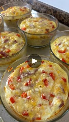 there are many small casseroles in the pans on the stove top ready to be cooked