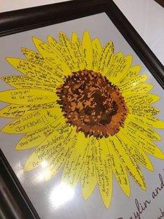 a sunflower with many words written on it and the bottom half of its frame