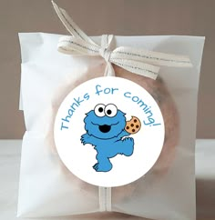 a cookie bag with a cookie in it that says thanks for confection on the front