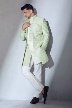 Pista green sherwani jacket with thread embroidery all over. Paired with a sleeveless kurta and pant. - Aza Fashions Pastel Green Sherwani Groom, Indowestern Outfits For Men, Sherwani Jacket, Green Sherwani, Wedding Matching Outfits, Stylish Boy Clothes, Men Styling, Sleeveless Kurta, Sherwani For Men Wedding