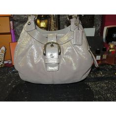 Coach 2011 Soho Lynn Metallic Pewter Shimmer Hobo Handbag F15527 Inside Has 3 Large Compartment, All Freshly Cleaned. Gorgeous Bag! Approximate Measurements 12" L X 9" H X 4" W The Strap Drop About 9" Used But Cared For/Authenticity Verified By Legit Grails See Attached Screen Print. I Will Send The Original Print Out With The Bag So You Have The Entire Certificate. All Used Bags/Shoes May Have The Following Discoloration Signs Of Use Scratches Scuffing Rubs Pls Check The Pictures Closely As The Vinegar And Baking Soda, Hobo Handbag, White Vinegar, Gorgeous Bags, Hobo Handbags, Bags Shoes, Original Prints, Screen Print, Soho