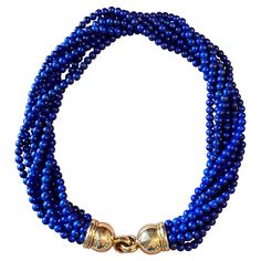 Attractive and timeless 18 K yellow Gold Torsade consisting of 8 strands fine Lapis Lazuli beads. The beads measure ca. 0.5 mm in Diameter. Signed Péclard Zurich. The length untwisted is: 44 cm. QUESTIONS? Contact us right away if you have additional questions. We are here to connect you with beautiful and affordable antique and estate jewelry. Masterfully handcrafted piece! Authenticity and money back is guaranteed. For any enquires, please contact the seller through the message center. Message Center, Lapis Lazuli Beads, Multi Strand Necklace, Zurich, Multi Strand, Estate Jewelry, Lapis Lazuli, Jewelry Necklaces, Yellow Gold