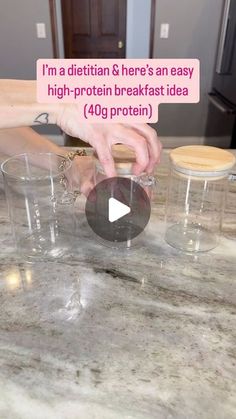 someone is pouring something into small glasses on the counter top, with an ad above it that says i'm a diettiant here's an easy high - protein breakfast idea 40g protein