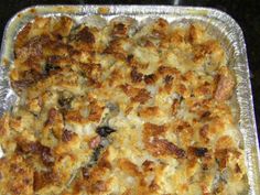 a casserole dish with meat and vegetables in it