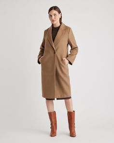 This is the one you've been waiting for. This tailored coat is made with premium Italian Melton Wool, sourced from a renowned Italian mill and known for its luxuriously smooth, felt-like texture and natural drape. The classic single-breasted design, complete with a notched lapel, single button, and pockets, offers a classic look that promises warmth—and style—all winter. Petite Wool Coat, Essential Wardrobe Pieces, Chic Coat, Elegant Coats, Long Puffer Coat, Wool Coats, Black Wool Coat, Tailored Coat, Single Breasted Coat