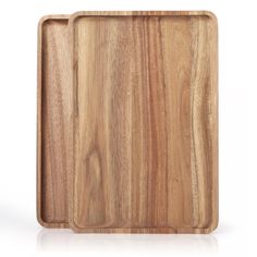 a wooden cutting board on a white background