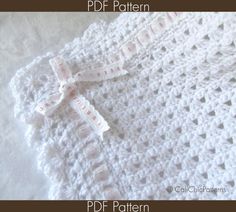 a crocheted baby blanket with measuring tape on the side and text overlay that reads, free crochet pattern