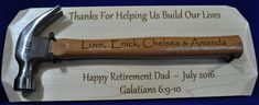 a hammer with a message on it sitting on top of a piece of paper that says, thanks for helping us build our lives