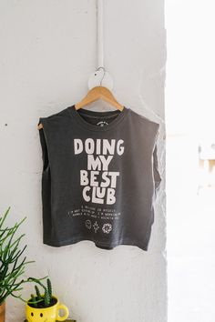 the design: doing my best club; I believe in myself. I'm not giving up. I'm working hard. the color: faded black tee with cream ink the fit: boxy, slightly cropped Kathryn is wearing a M. Alyssa is wearing a S. Molly is wearing a L. about: 6 oz./yd², 100% cotton, garment-dyed, 18 singles garment-dyed for that vintage, faded look and almost no shrinkage at home boxy fit, slightly cropped wide rib collar taped neck and shoulders for comfort and durability structured shoulders care: wash with like Muscle Tee Outfit Street Style, Tee Design Ideas, Styling Graphic Tees, Band Tee Outfits, I Believe In Myself, Believe In Myself, Run Club, Not Giving Up, Doing My Best