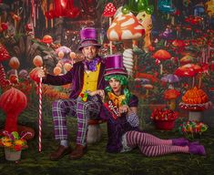 a man and woman dressed up as the mad hatter with candy canes in front of mushrooms