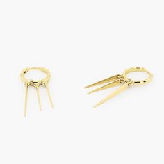 Details	Gold KT: 14K	Measurement: Length 34mm // Width 13mmThree spikes hang from these trendy 14k gold hoop earrings. We want to create the perfect gift for your loved one so we offer three custom gold colors. Choose from: Yellow Gold, Rose Gold, and White Rhodium to create a pair of stylish tribal spike earrings that's unique to her personal style. Shipping Time 10-12 Working Days 14k Gold Hoop Earrings, Spike Earrings, Gold Colors, Art Deco Ring, Gold Hoops, Measurement Length, Gold Hoop, Gold Hoop Earrings, Gold Rose