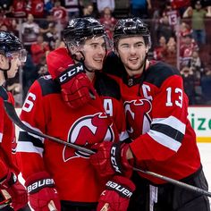 two hockey players are congratulating each other