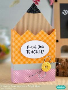 a thank you teacher card with a yellow flower