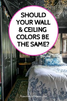 a bed sitting in a bedroom next to a book shelf with a pink circle above it