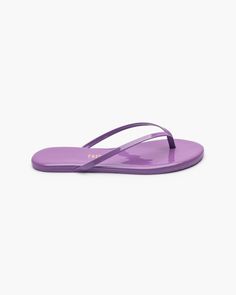 Patent Gloss Lily sandals feature a sleek and glossy finish that elevates their minimalist design with a playful burst of color. Modern Glossy Finish Sandals For Spring, Adjustable Purple Flip Flops For Summer, Purple Open Toe Summer Flip Flops, Purple Synthetic Summer Flip Flops, Purple Non-slip Slide Sandals, Purple Non-slip Synthetic Sandals, Vegan Kids, Simple Top, Flip Flop Sandals