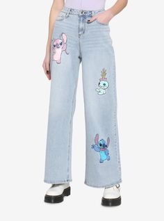 Stitch and the gang are here to add a bit of fun to your look! These Lilo & Stitch jeans have a straight-leg fit and come with 5 pockets. There are prints of Angel Stitch and Scrump on the legs. Button and zipper closure. Stitch Shoes Cheap, Disney Jeans, Stitch And Scrump, Angel Stitch, Stitch Jeans, Lilo And Stitch Merchandise, Stitch Toy, Lilo Y Stitch, Stitch Clothes