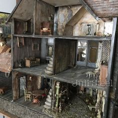 a doll house is shown with all the furniture and accessories in it's display case