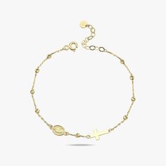 A solid gold rosary bracelet with a raised Mary motif and a gold cross, designed for comfort and ideal for expressing faith or gifting. Made to comfortably fit in the wrist, it is perfect for conveying or honoring one’s faith by presenting it as a special gift to loved people. Suitable for any one or even special dates is how stylish this earring is while designed with your devotion in mind; It is not only a sign of spirituality but also an elegant thicken.PRODUCT DETAILS: Material: 14K Solid Gold or Gold Plated Silver Bracelet Length: adjustable 6" to 7" Charm lenght 15mm & 7mm Closure: Spring ring Chain style: Cable Adjustable Gold Sterling Silver Rosary Bracelet, Gold Rosary, Solid Gold Bracelet, Rosary Bracelet, Gold Cross, Chain Ring, Heartfelt Gifts, Gold Plated Silver, Rosary