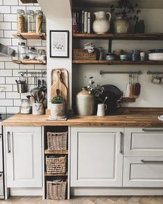 the kitchen is clean and ready to be used as a storage area for cooking utensils