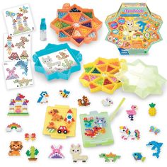 an assortment of toys and crafts for children to play with