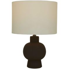 a black table lamp with a white shade