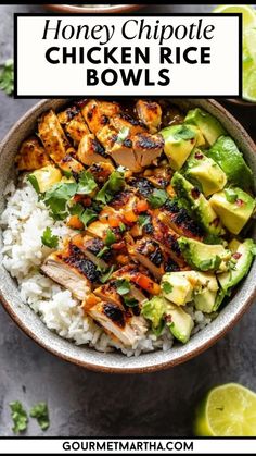 a bowl filled with chicken, rice and avocado on top of a table