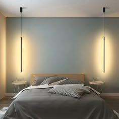 a bed with two lamps on either side of it