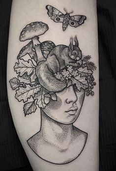 a woman's head with mushrooms and leaves on her left arm, in black and white