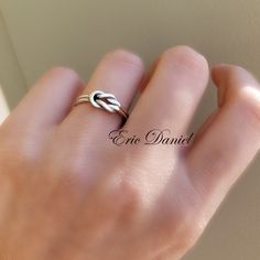 This simple yet timeless love knot ring is made of genuine .925 Sterling Silver. There is a slight bend on one side of the ring which is necessary for the one knot to loop under the other. This is normal and not a defect of the ring. Metal: Sterling Silver Sterling Silver with Yellow Gold Overlay Sterling Silver with Rose Gold Overlay Production Time: Silver: 3-5 Business Days Silver with Yellow or Rose Gold: 7-10 Business Days Customer Service is our top priority. If you are unhappy with your p Elephant Necklace Gold, Ring Symbolism, Peace Ring, Infinity Knot Ring, Silver Infinity Ring, Graduation Rings, Friendship Ring, Love Knot Ring, Elephant Ring