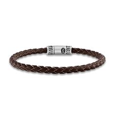 Rugged strips of handsome brown leather are woven together in this stylish men's bracelet. Fashioned in sterling silver, the 8.5-inch men's bracelet secures in place with a custom clasp. The signature "E" is stamped on the clasp to identify each piece as part of the 1933 by Esquire men's collection. Brown Leather Braided Bracelet, Brown Braided Leather Bracelets, Brown Braided Bracelets For Everyday, Everyday Brown Braided Bracelets, Masculine Leather Bracelet With Stainless Steel Clasp, Adjustable Brown Leather Bracelet With Stainless Steel Clasp, Classic Braided Leather Bracelets, Adjustable Leather Braided Bracelet With Stainless Steel Clasp, Adjustable Brown Bracelet With Stainless Steel Clasp