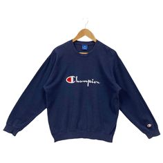 Vintage 90s Champion Sweatshirt Champion Sweater Champion Crewneck Pullover OG Champion Spellout Big Logo Embroidery Blue M * Used item. In fair condition (6/10) * Minor signs of wear (view photos) * Tagged size Medium. Flat laid measurements (appoximately) - Chest (underarm to underarm) : 22 inches - Length (side of neck seam to bottom hem) : 24.5 inches BUY 3 ITEMS GET FREE SHIPPING WORLDWIDE ATTENTION : PLEASE READ * SHIPPING via PREMIUM EXPRESS. Delivery about 5 business days to major cities Champion Sweater, Embroidery Blue, Champion Crewneck, Champion Brand, Champion Sweatshirt, Logo Embroidery, Oversized Sweater, Winter Wear, Pullover Sweatshirts