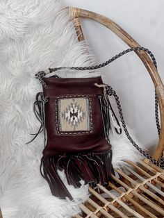 "Get ready to rock that boho-chic look with the Pranee Eliza Crossbody bag in genuine handmade leather! Perfect for carrying all your essentials, the fringe detailing adds a touch of fun and play to your style. This is the ultimate statement piece for the free-spirited fashion lover! (Psst...makes for a great conversation starter too!)" Bohemian Leather Hobo Bag For Fall, Bohemian Shoulder Bag For Fall, Bohemian Bags With Beaded Fringe For Everyday Use, Bohemian Brown Bag With Beaded Fringe, Bohemian Shoulder Bag With Tassels For Fall, Bohemian Fall Bags With Tassels, Artisan Leather Shoulder Bag With Fringe, Hippie Leather Shoulder Bag For Everyday, Artisan Shoulder Bag With Tassels For Everyday