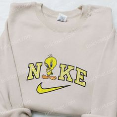 The Nike x Tweety Cartoon Embroidered Sweatshirt is a playful and stylish addition to your wardrobe. Made with high-quality materials, Nike Christmas, Nike Cartoon, Nike Inspired, Mirabel Madrigal, Walt Disney Characters, Best Family Gifts, Embroidered Shirts, Cartoon Shirts, Cartoon Christmas