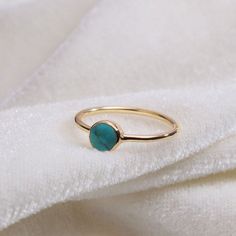 "Materials Gold, Rose gold, White gold Gemstone: turquoise Turquoise Ring / Round Cut Turquoise Ring In 14k Gold / Stackable Turquoise Ring / Natural Turquoise / December Birthstone Ring / Fine Ring Item Features * Made to Order. * Gold KT: 14K * Custom Gold Color: Rose Gold, Yellow Gold, White Gold * Gemstone Cut: Round * Number of Stones: 1 * Stone Size: 4 mm * Setting Type: Bezel * Band Width: 1.25mm * Ring is marked gold Marked * ready to Ship in 7-10 Business Days * Also available in other Gold Turquoise Ring With Gemstone, Gold Turquoise Ring Fine Jewelry, Gold Turquoise Ring Birthstone For Gift, Gold Turquoise Birthstone Ring Gift, Gold Turquoise Ring Gift, Gold Turquoise Ring For Gift, Dainty Gold Turquoise Gemstone Ring, Dainty Gold Turquoise Ring, Turquoise Round Opal Ring In 14k Gold