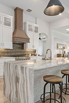 Beautiful modern kitchen design with textured backsplash and waterfall edge kitchen island. Upstairs Loft Ideas, Textured Backsplash, Upstairs Loft, Loft Spaces, Home Designs, New Homes For Sale, San Antonio Tx